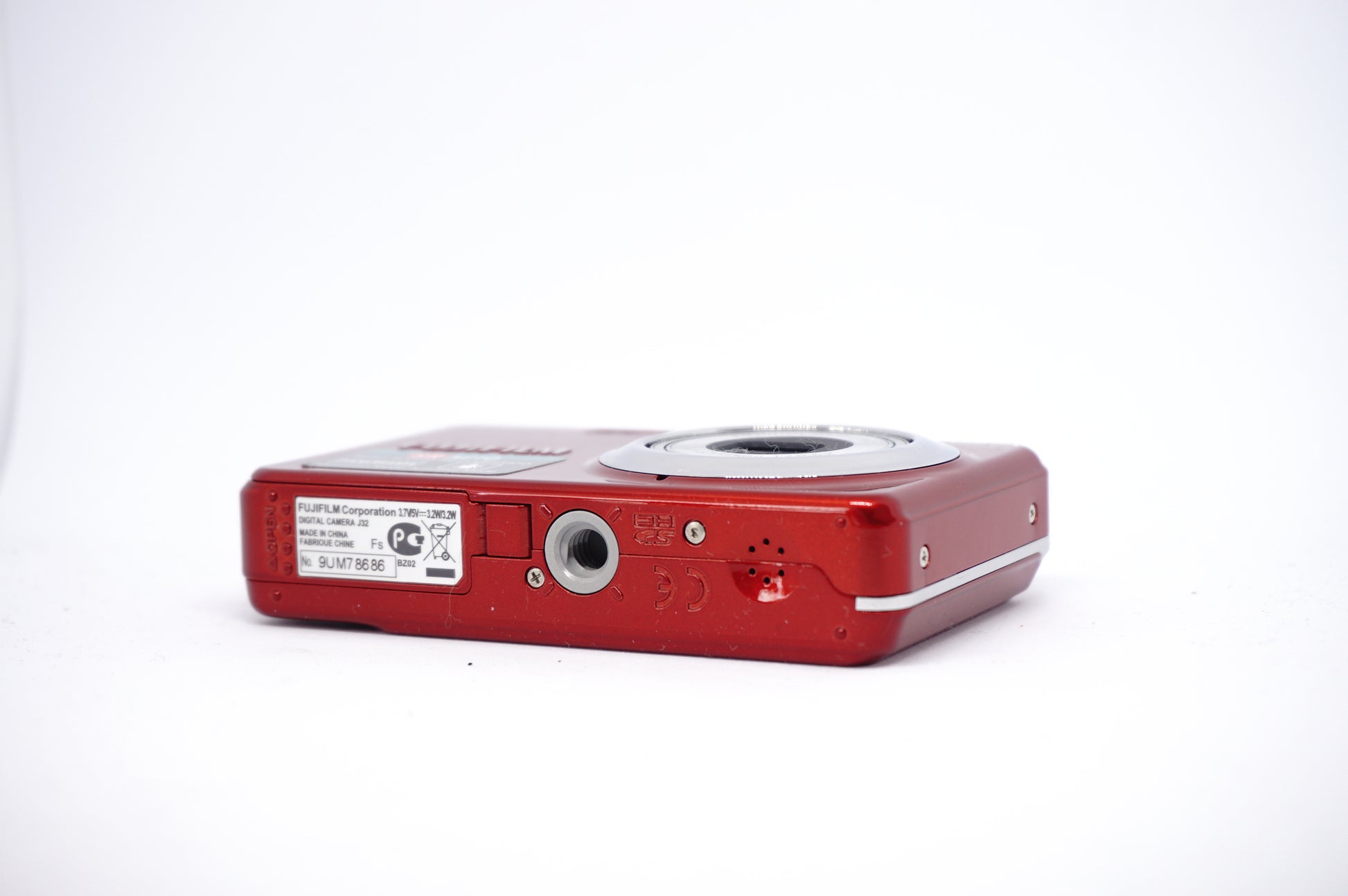 Fujifilm Red 12MP Compact Digital Camera underneath view